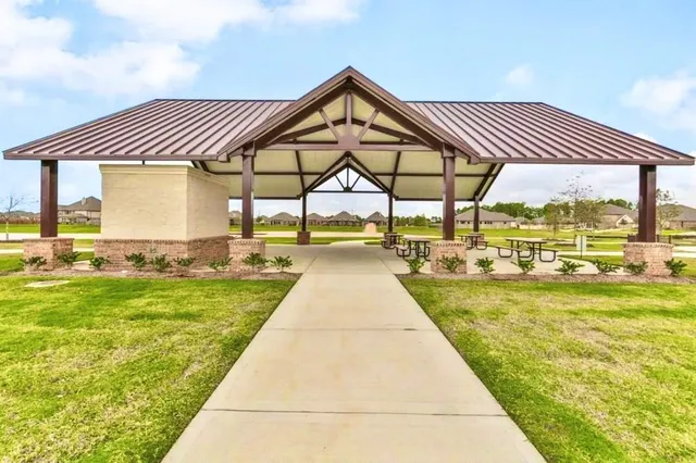 a view of swimming pool with a garden