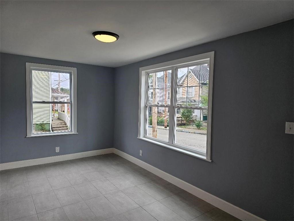 477 Connecticut Avenue Rochester, PA 15074 - Photo 17 of 17 an empty room with a window