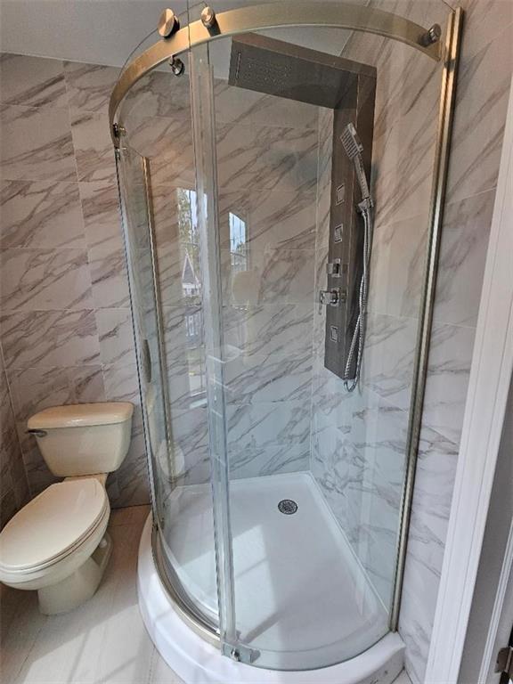 477 Connecticut Avenue Rochester, PA 15074 - Photo 6 of 17 a bathroom with a toilet and a shower