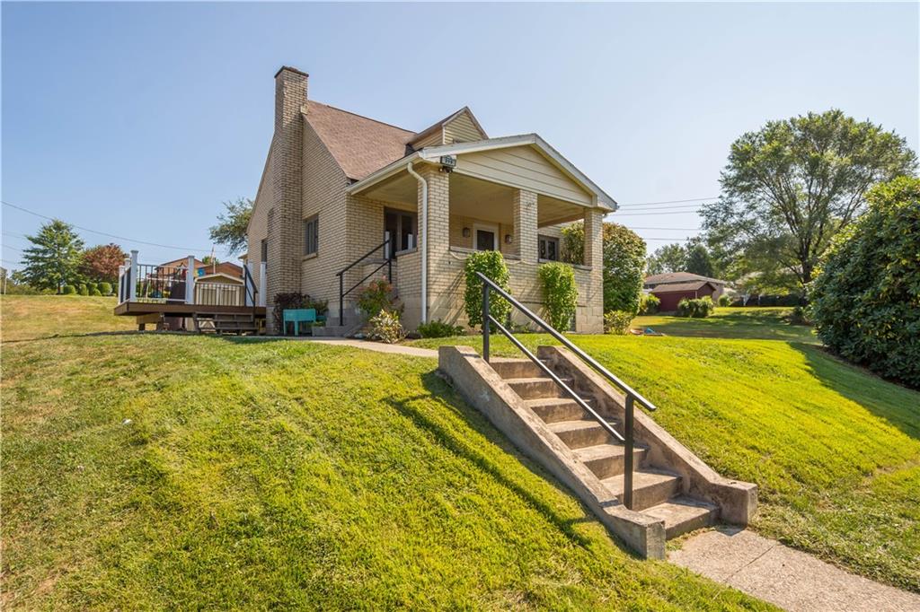 a view of a house with swimming pool