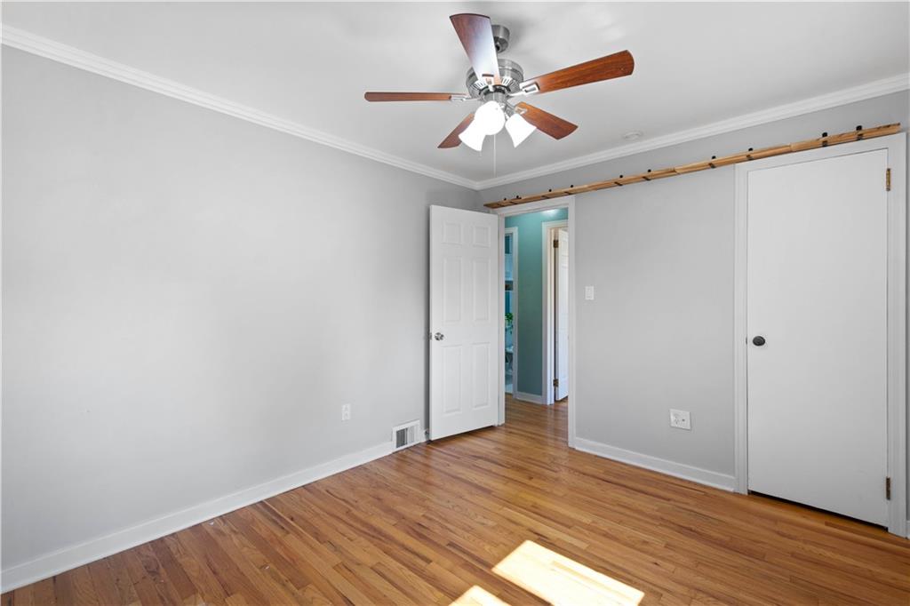 215 Pinchtown Road Pittsburgh, PA 15236 - Photo 12 of 31 wooden floor in an empty room