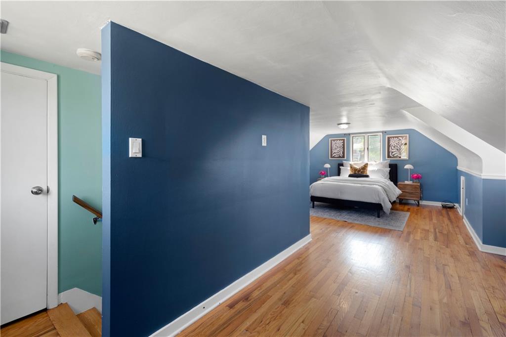 215 Pinchtown Road Pittsburgh, PA 15236 - Photo 15 of 31 a living room with furniture and a wooden floor