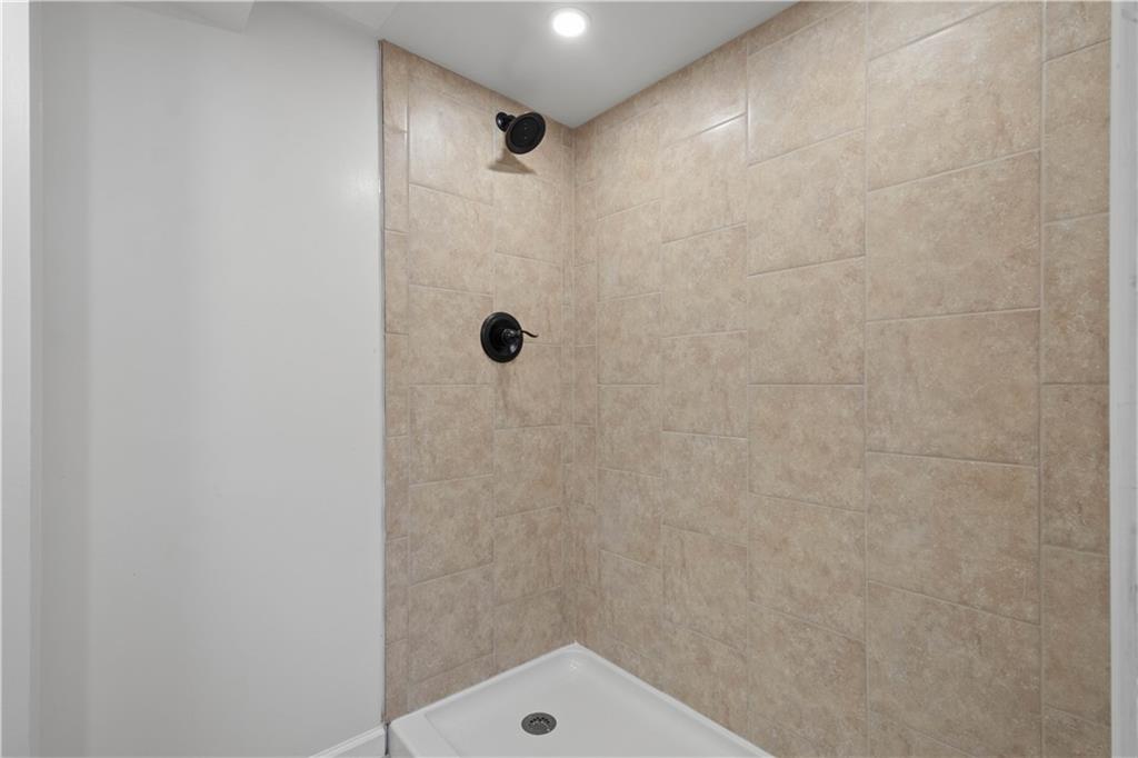 215 Pinchtown Road Pittsburgh, PA 15236 - Photo 21 of 31 a bathroom with a shower and a sink