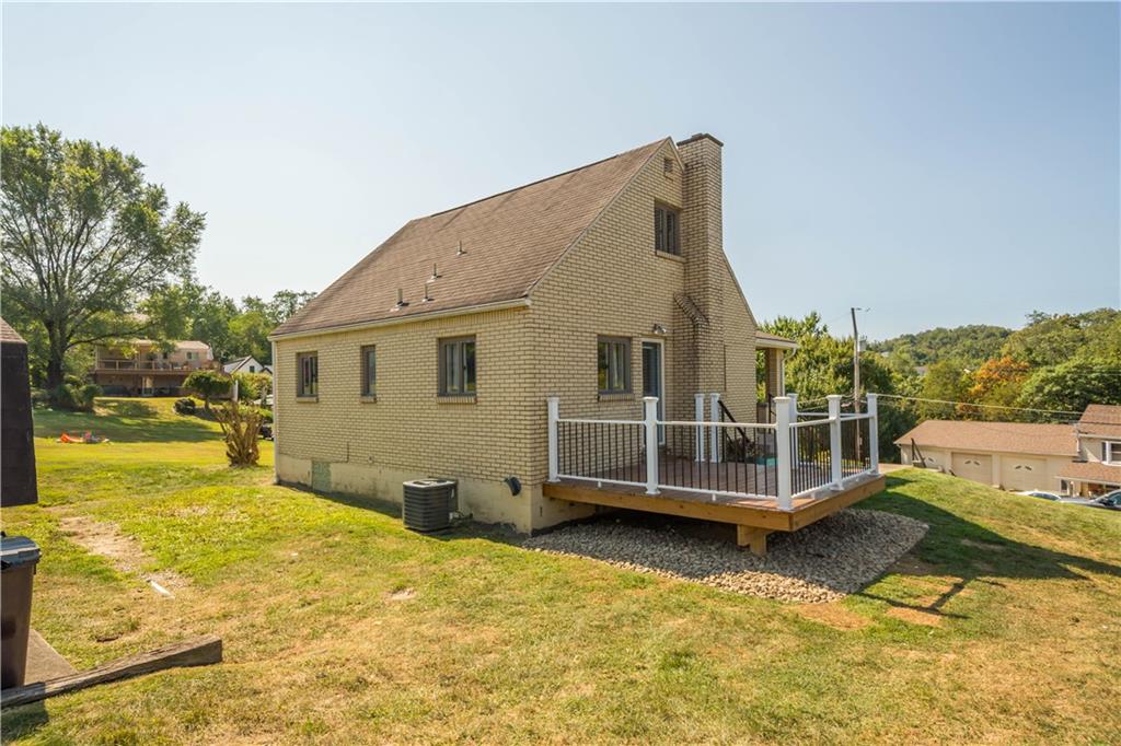 215 Pinchtown Road Pittsburgh, PA 15236 - Photo 25 of 31 a view of a swimming pool with an outdoor seating