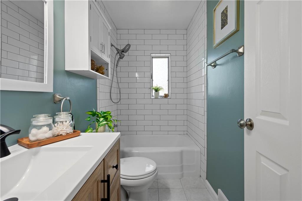 215 Pinchtown Road Pittsburgh, PA 15236 - Photo 7 of 31 a bathroom with a sink toilet and shower