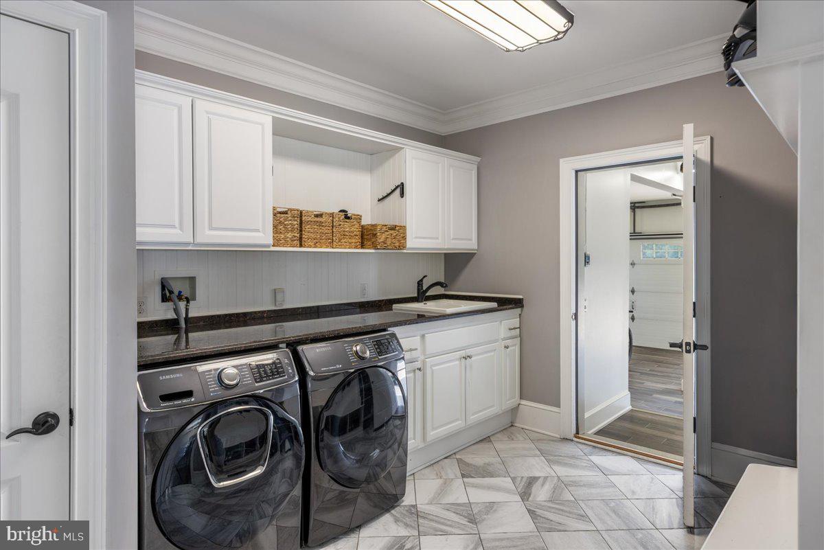 29 Tumble Falls Road Stockton, NJ 08559 - Photo 49 of 78 a utility room with cabinets