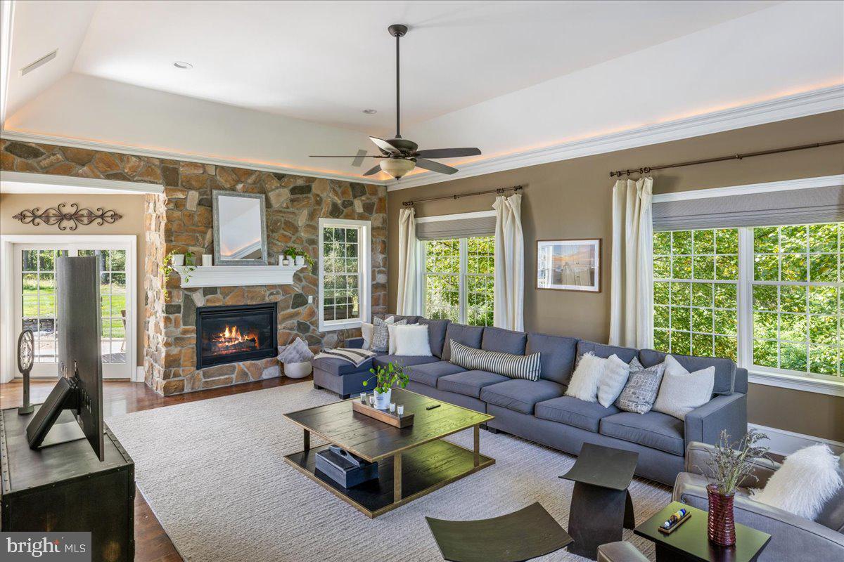 29 Tumble Falls Road Stockton, NJ 08559 - Photo 5 of 78 a living room with furniture fireplace and a large window