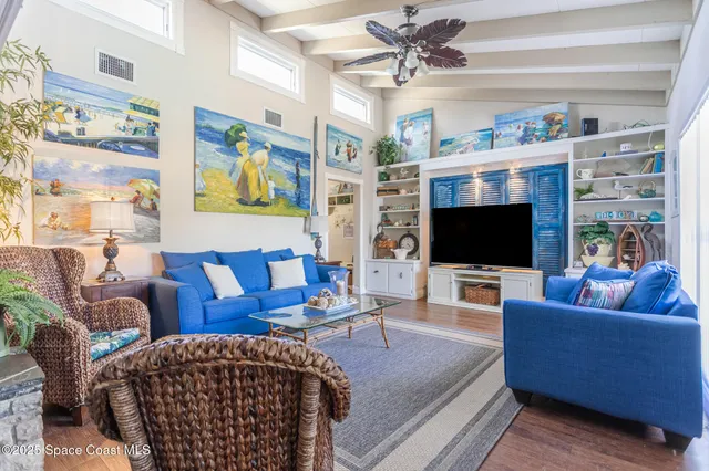 a kitchen with a refrigerator and a sink