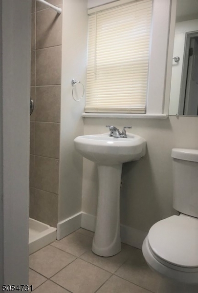 3 William Street, Unit 2 Montclair, NJ 07042 - Photo 20 of 21 a bathroom with a sink a toilet and shower