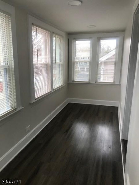 3 William Street, Unit 2 Montclair, NJ 07042 - Photo 7 of 21 a view of wooden floor and windows in a room