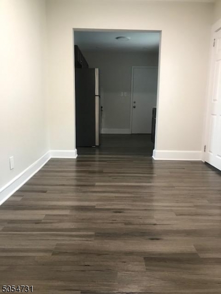 3 William Street, Unit 2 Montclair, NJ 07042 - Photo 10 of 21 a view of an empty room with wooden floor