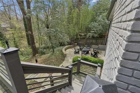 a view of a pathway with a patio