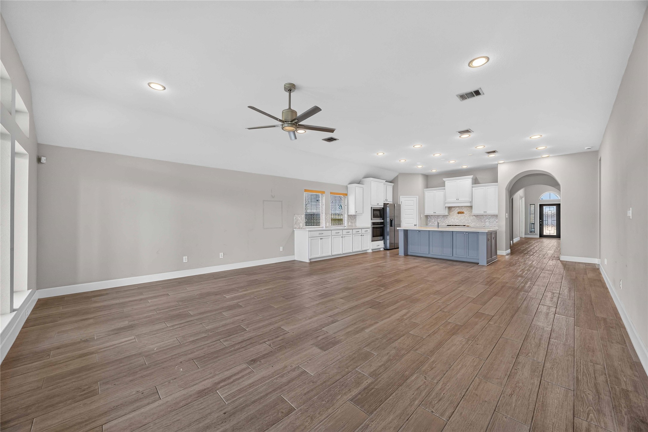 4333 Arbor Crest Lane Manvel, TX 77578 - Photo 8 of 40 The open-concept design allows for a fluid transition between cooking, dining, and relaxing, providing a highly versatile layout that scales effortlessly for hosting.