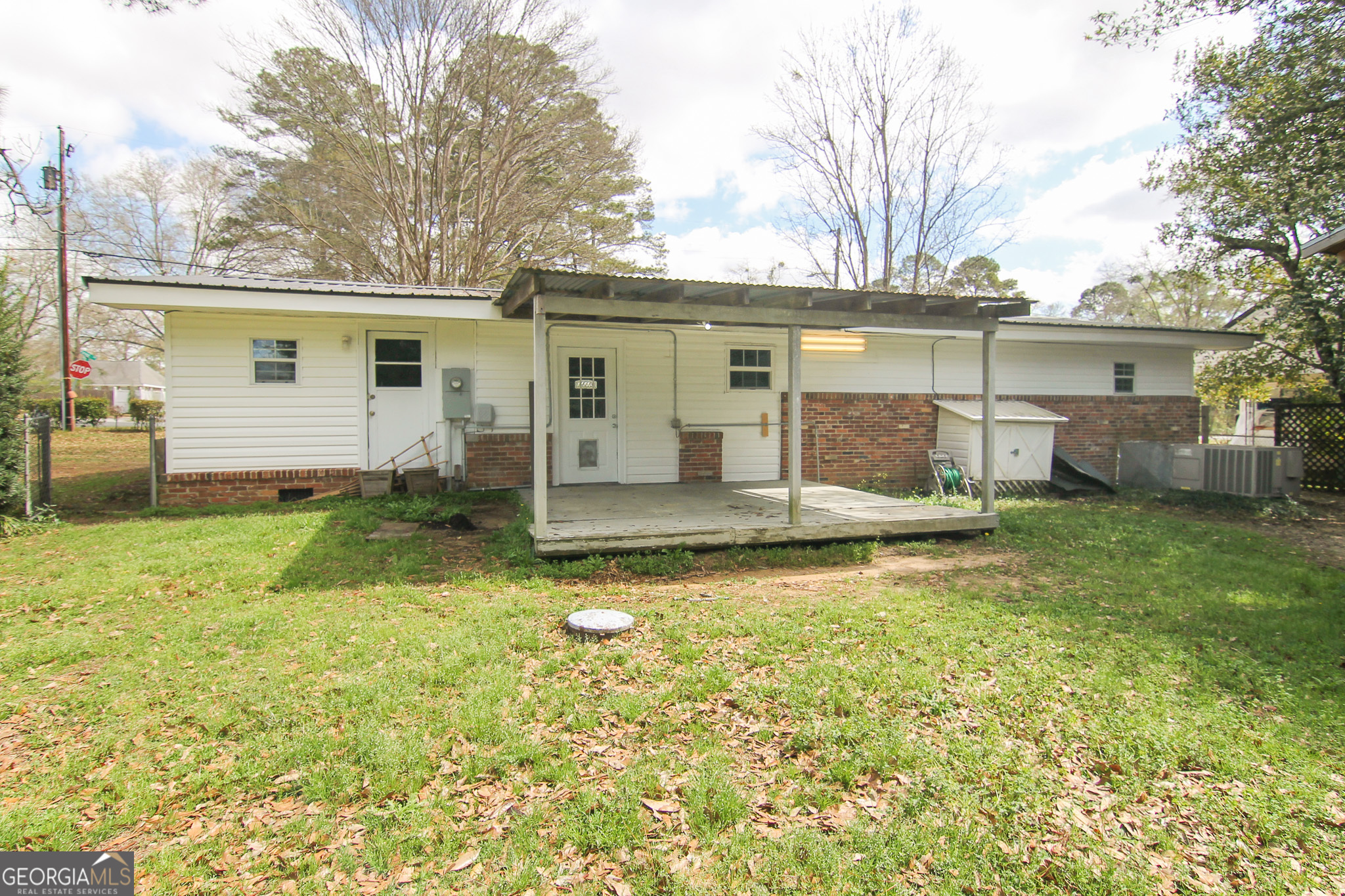 48 Forest Avenue Butler, GA 31006 - Photo 21 of 21 front view of a house with a yard