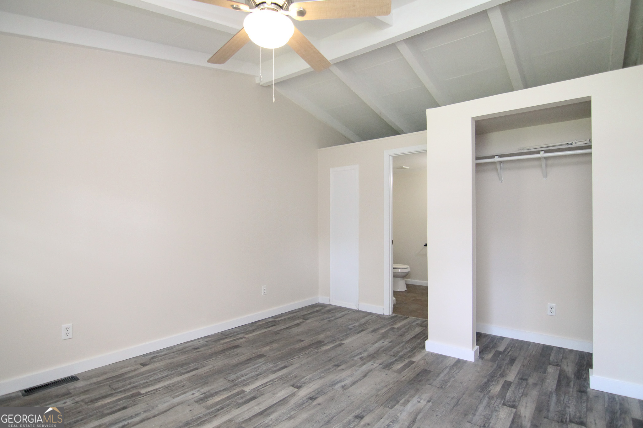 48 Forest Avenue Butler, GA 31006 - Photo 9 of 21 a view of an empty room with wooden floor