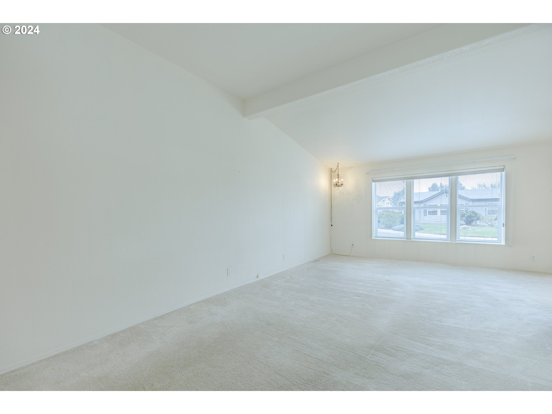 3220 Crescent Avenue, Unit 67 Eugene, OR 97408 - Photo 35 of 48 a view of an empty room with a window