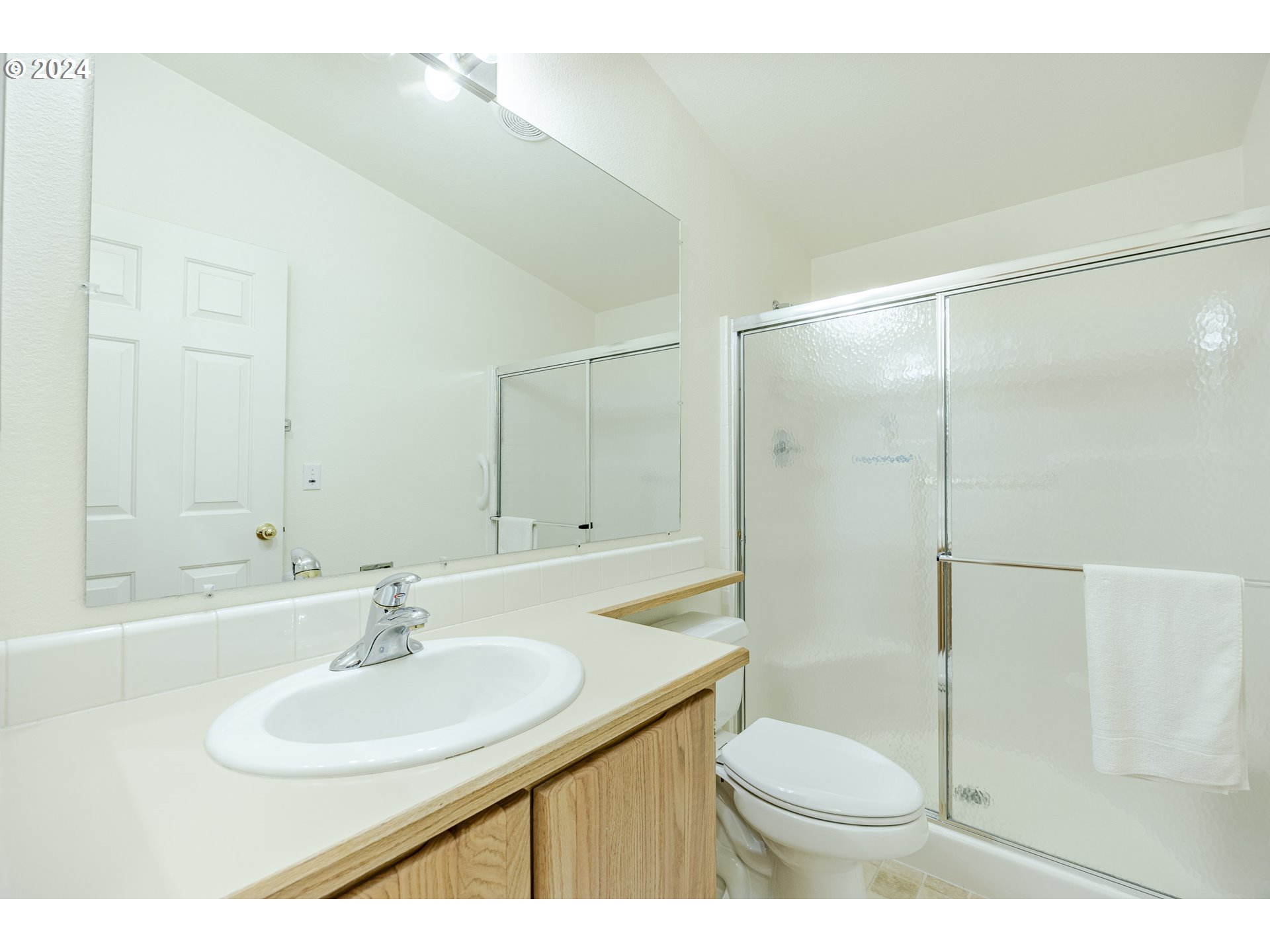 3220 Crescent Avenue, Unit 67 Eugene, OR 97408 - Photo 44 of 48 a bathroom with a sink toilet and shower