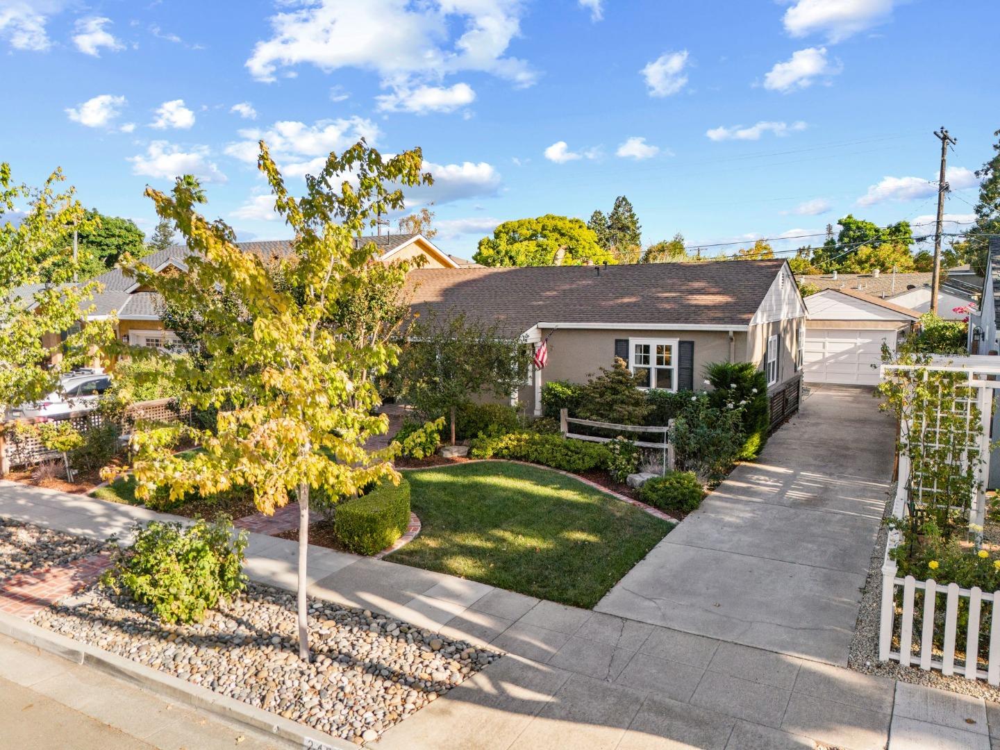2428 Tulip Road San Jose, CA 95128 - Photo 13 of 59 a front view of a house with garden