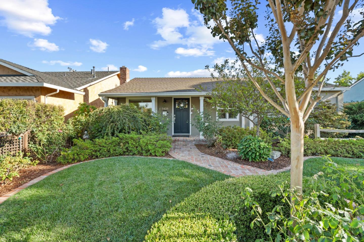 2428 Tulip Road San Jose, CA 95128 - Photo 15 of 59 a view of a house with a big yard plants and large tree