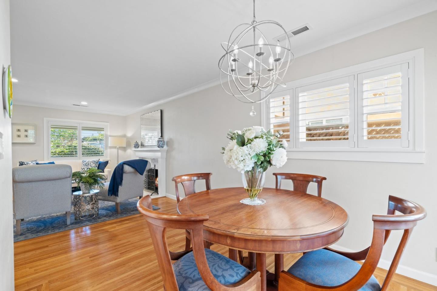 2428 Tulip Road San Jose, CA 95128 - Photo 32 of 59 a view of a dining room with furniture a chandelier and wooden floor