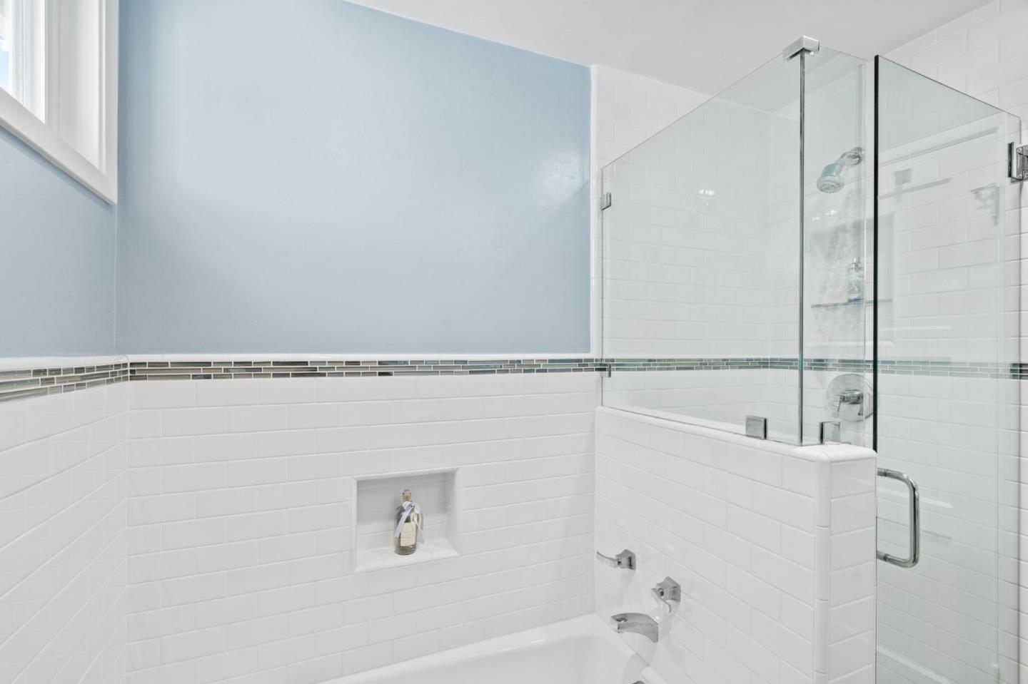 2428 Tulip Road San Jose, CA 95128 - Photo 37 of 59 a bathroom with a bathtub and a shower