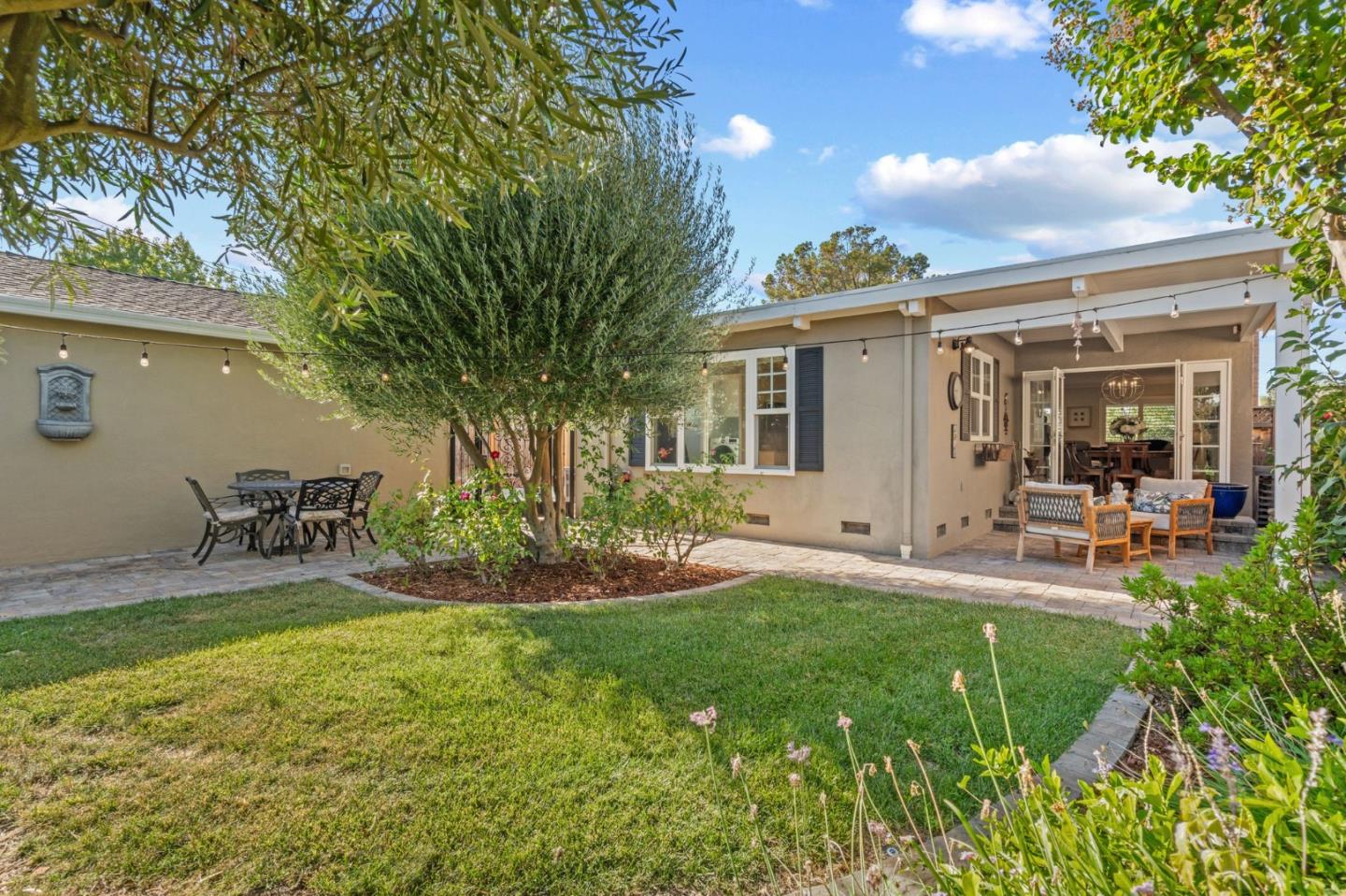 2428 Tulip Road San Jose, CA 95128 - Photo 47 of 59 a view of a house with backyard and sitting area