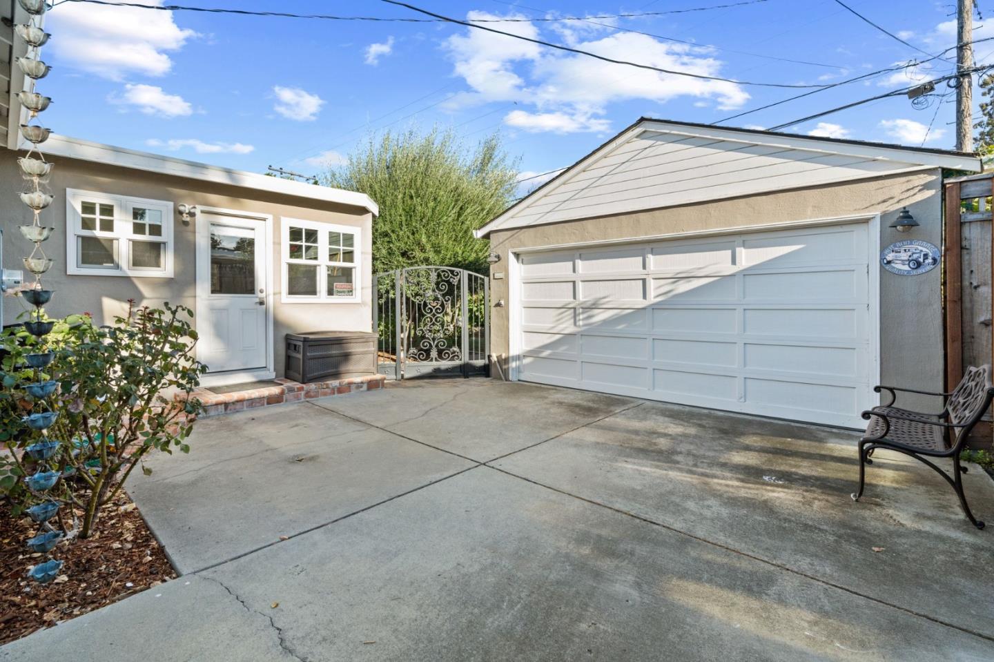 2428 Tulip Road San Jose, CA 95128 - Photo 48 of 59 a view of a house with a yard and garage