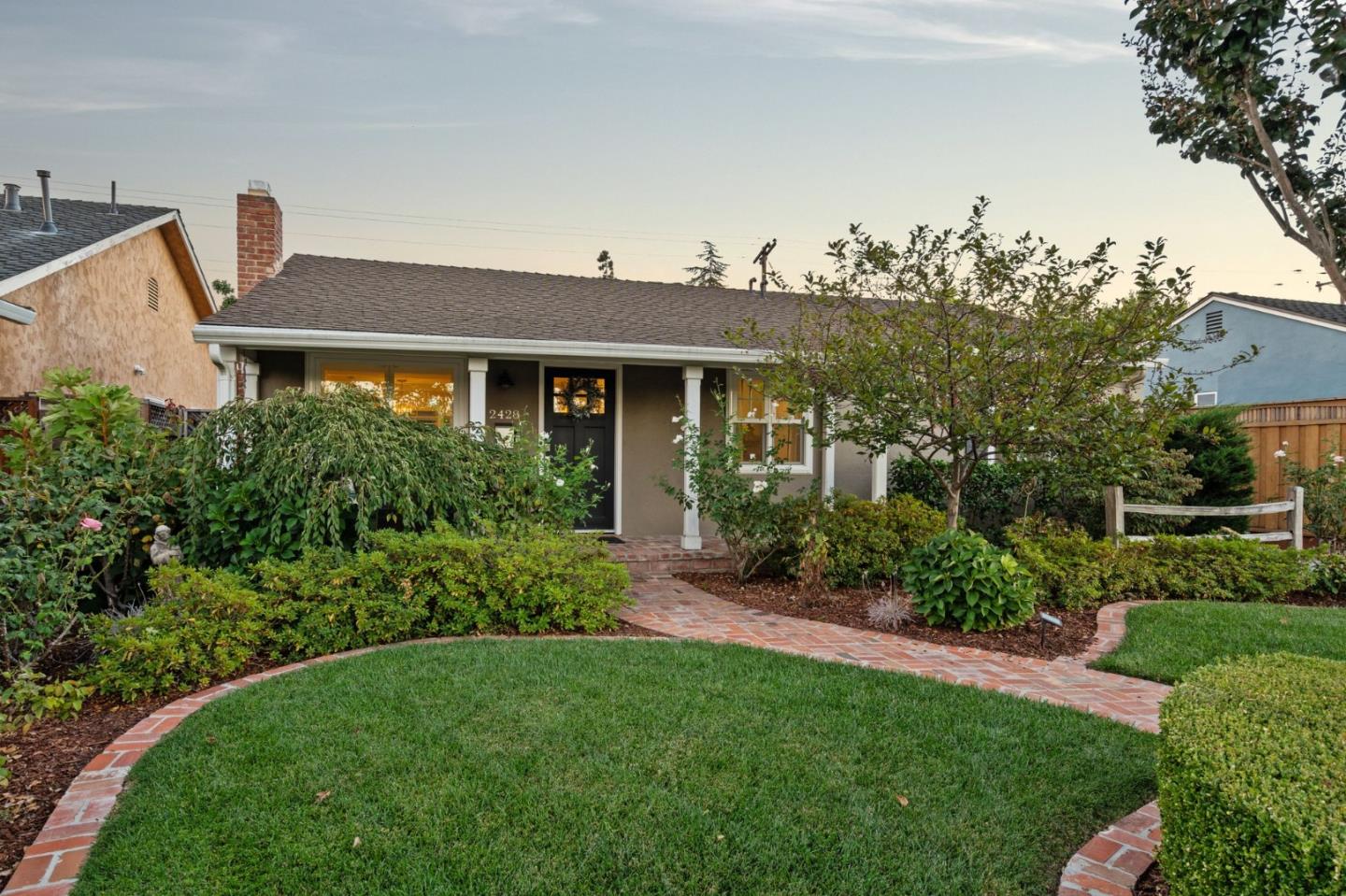 2428 Tulip Road San Jose, CA 95128 - Photo 49 of 59 a front view of a house with garden