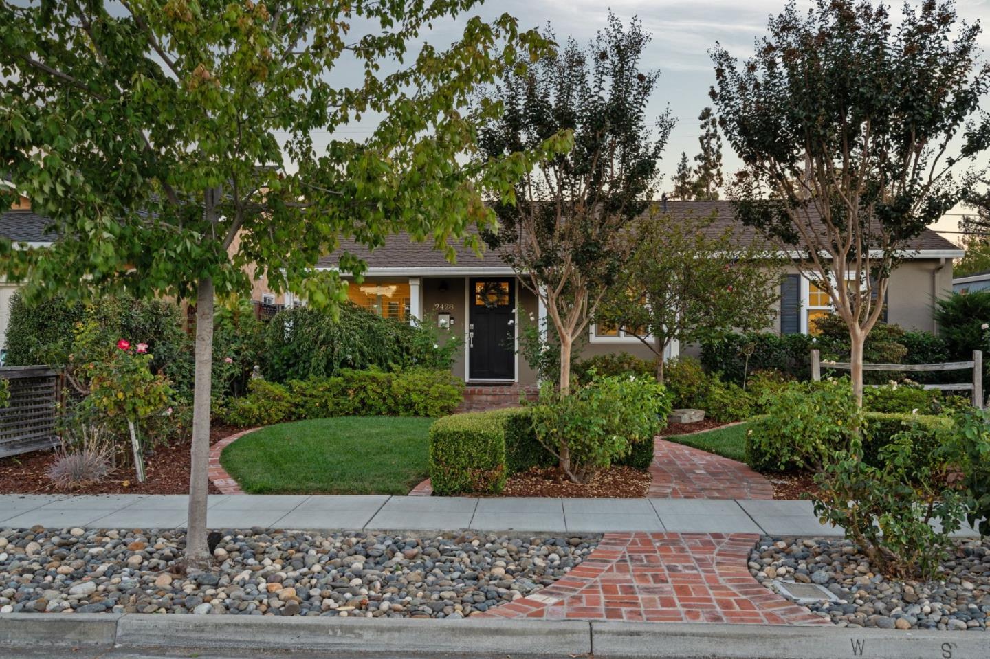 2428 Tulip Road San Jose, CA 95128 - Photo 51 of 59 a front view of a house with garden