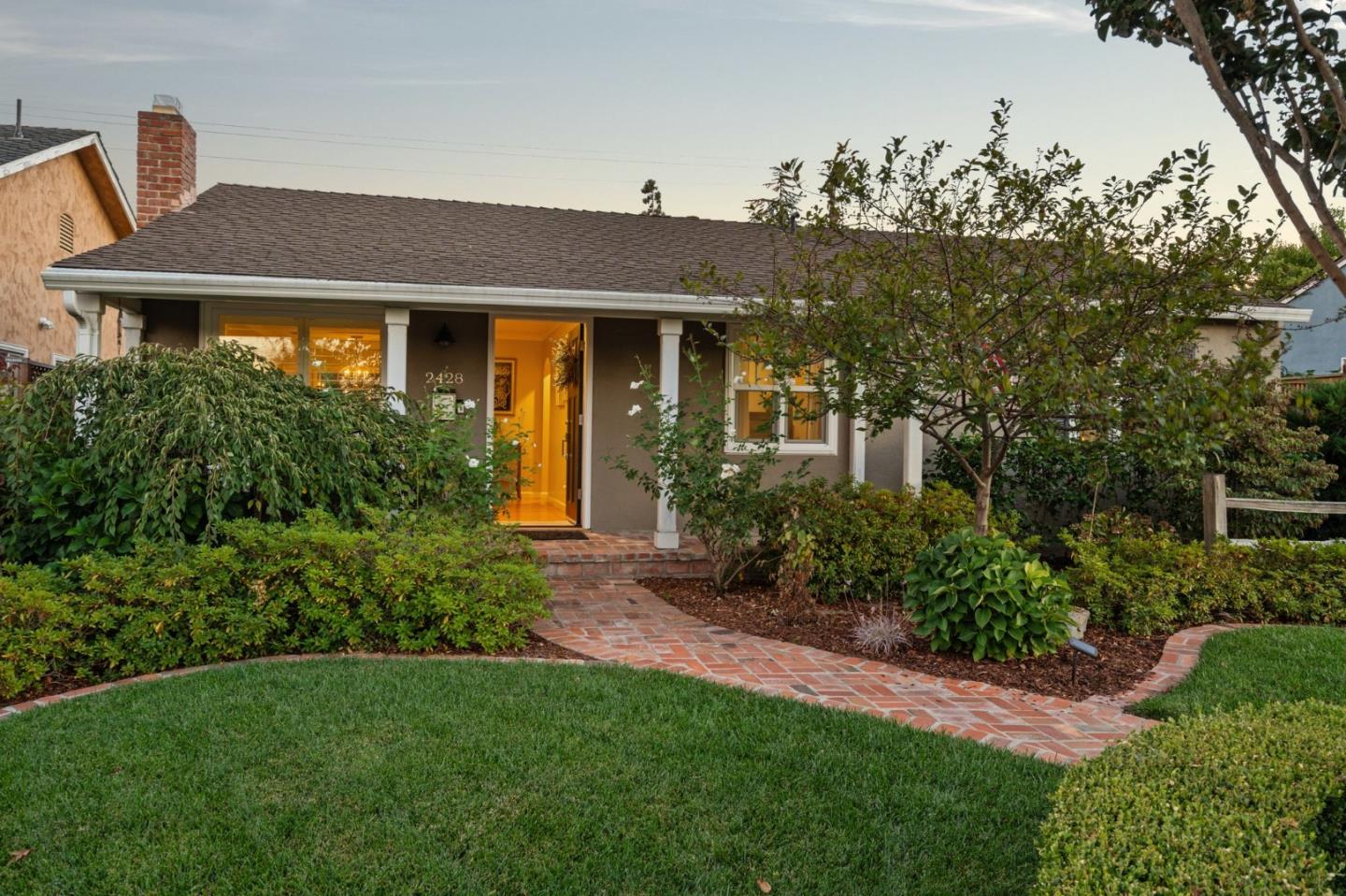 2428 Tulip Road San Jose, CA 95128 - Photo 54 of 59 a front view of a house with garden