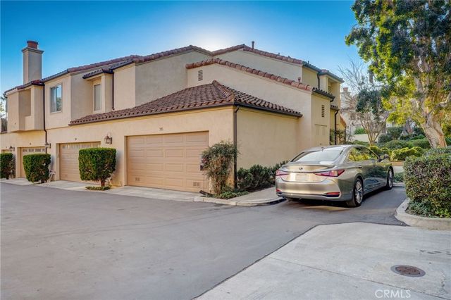 a car parked in front of a house