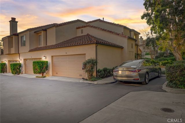 a car parked in front of a house