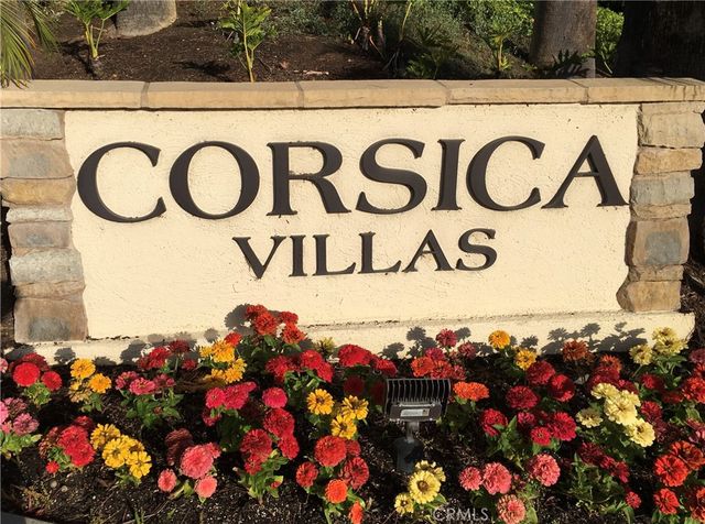 a street sign that is on a wall