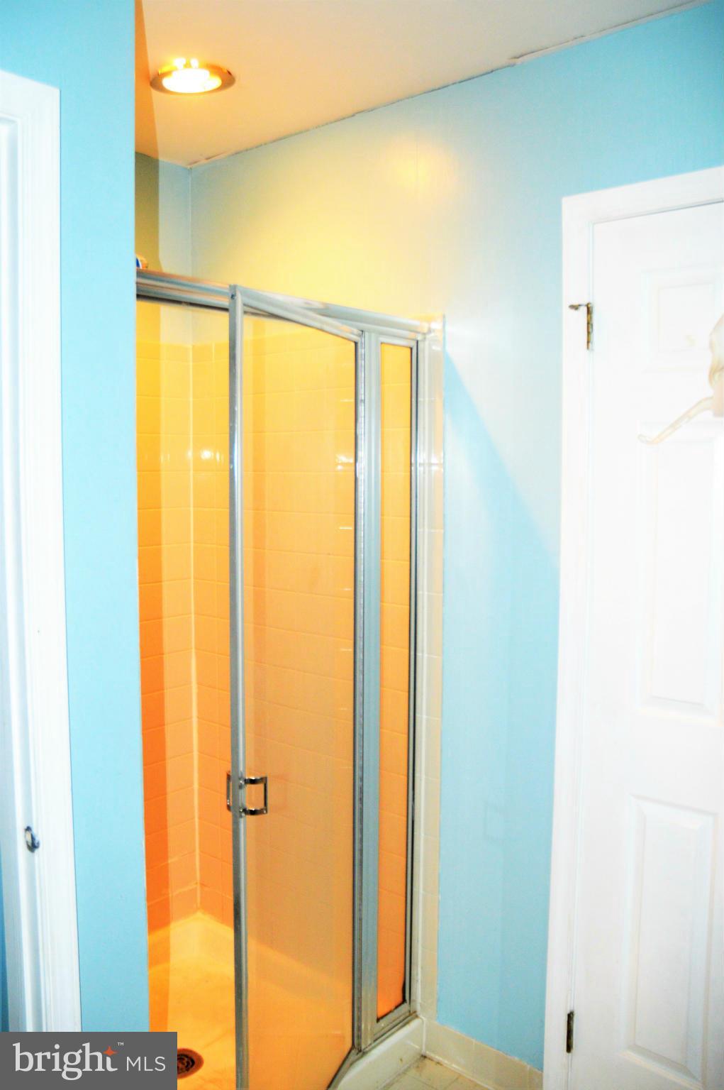 12243 Apache Tears Circle Laurel, MD 20708 - Photo 13 of 22 a bathroom with a shower