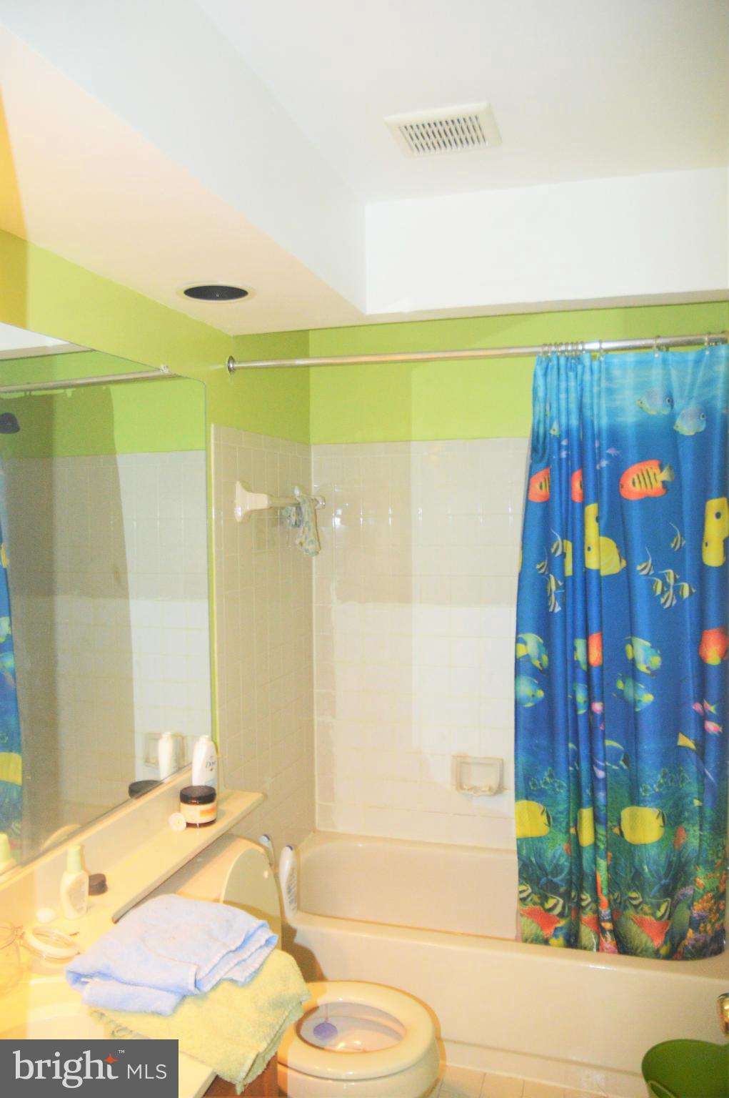 12243 Apache Tears Circle Laurel, MD 20708 - Photo 14 of 22 a bathroom with a sink and a shower