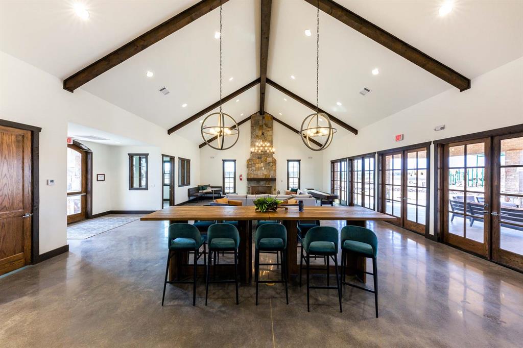 1621 Primms Place Fort Worth, TX 76052 - Photo 35 of 40 a view of a dining room with furniture window and wooden floor