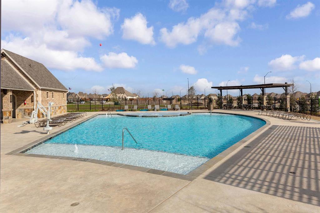 1621 Primms Place Fort Worth, TX 76052 - Photo 38 of 40 a view of a swimming pool with a yard