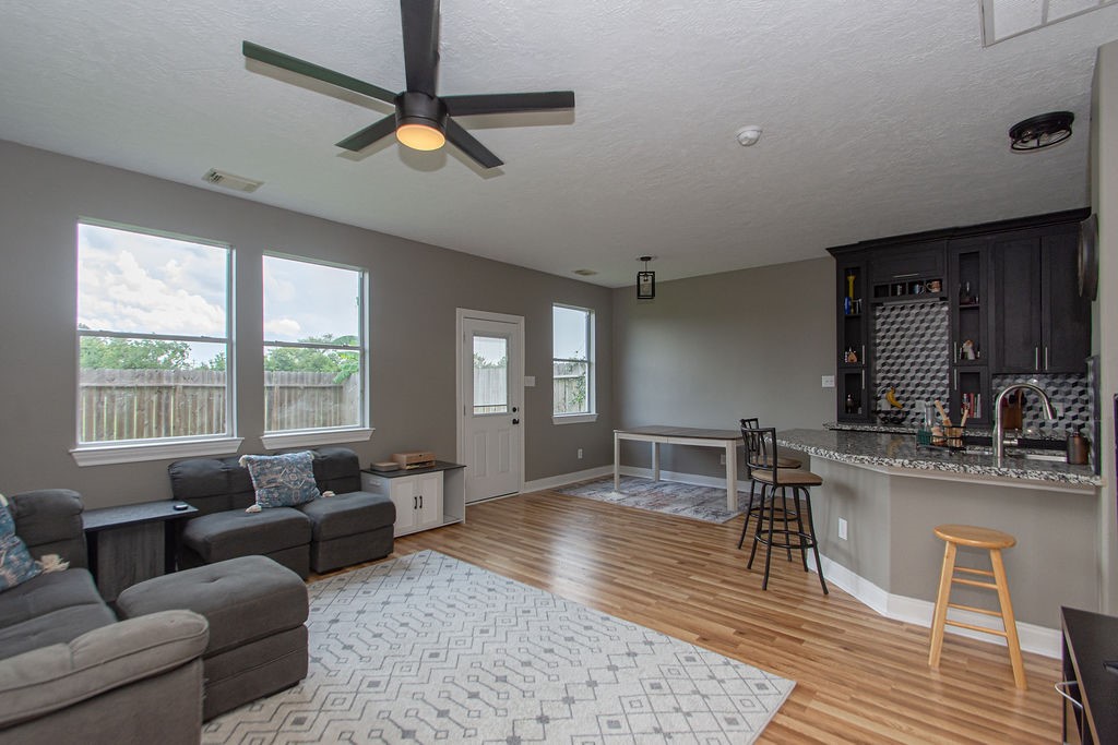 242 Drake Run Lane Dickinson, TX 77539 - Photo 3 of 18 a living room with furniture and a large window