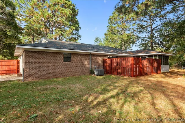 a backyard of a house with lots of green space