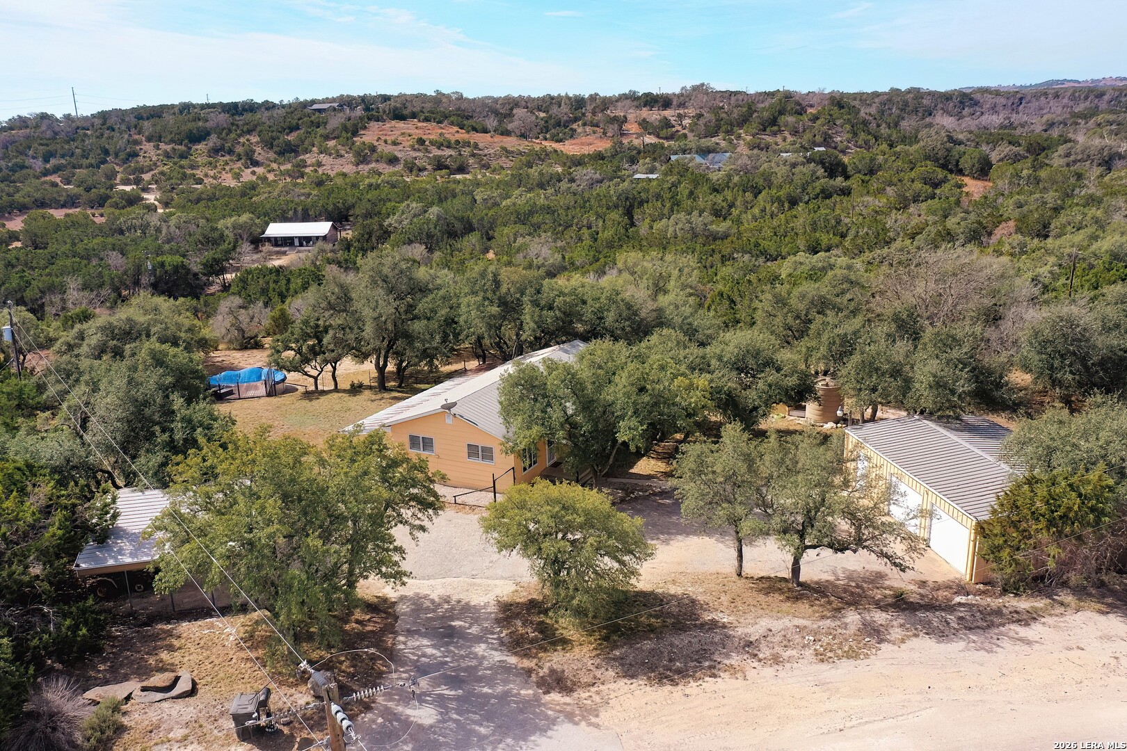 3909 McCall Creek Road Blanco, TX 78606 - Photo 1 of 55 an aerial view of a house