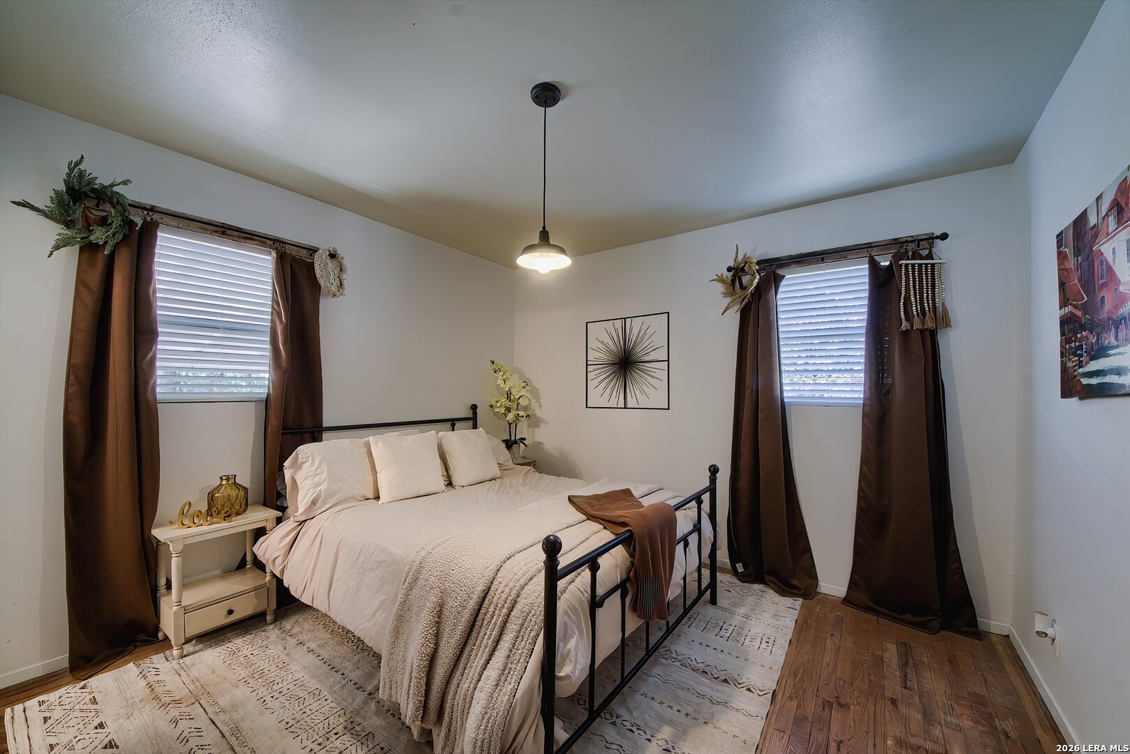 3909 McCall Creek Road Blanco, TX 78606 - Photo 12 of 55 a bedroom with a bed and a walk in closet
