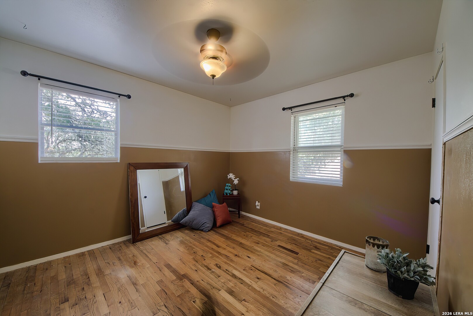 3909 McCall Creek Road Blanco, TX 78606 - Photo 17 of 55 a bedroom with bed and window