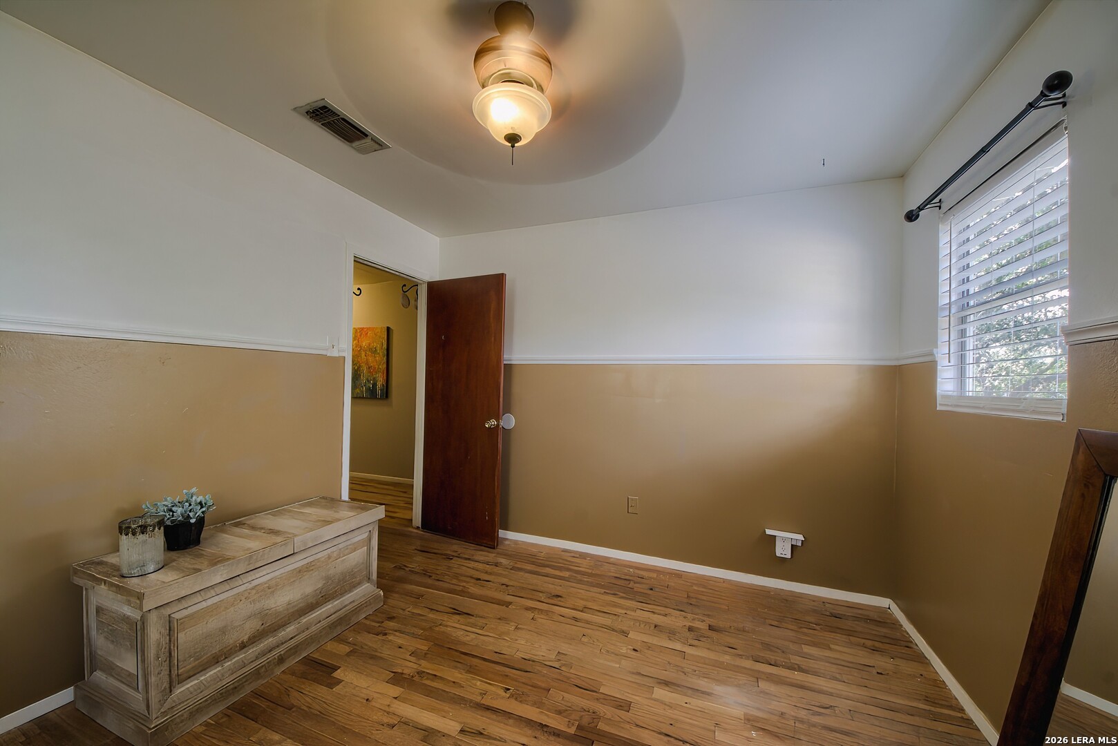 3909 McCall Creek Road Blanco, TX 78606 - Photo 19 of 55 a view of room with window and wooden floor