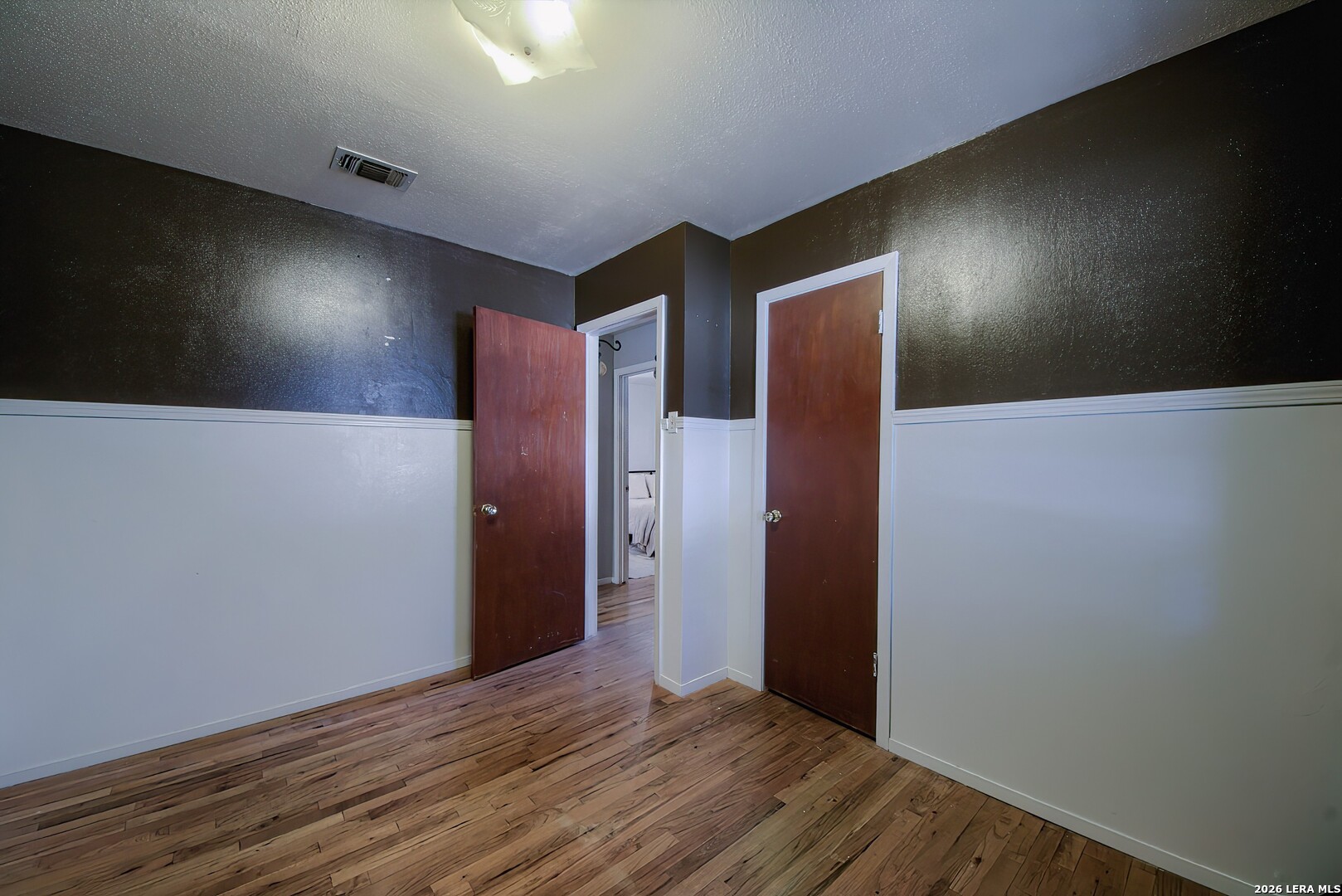 3909 McCall Creek Road Blanco, TX 78606 - Photo 21 of 55 a view of hallway with wooden floor