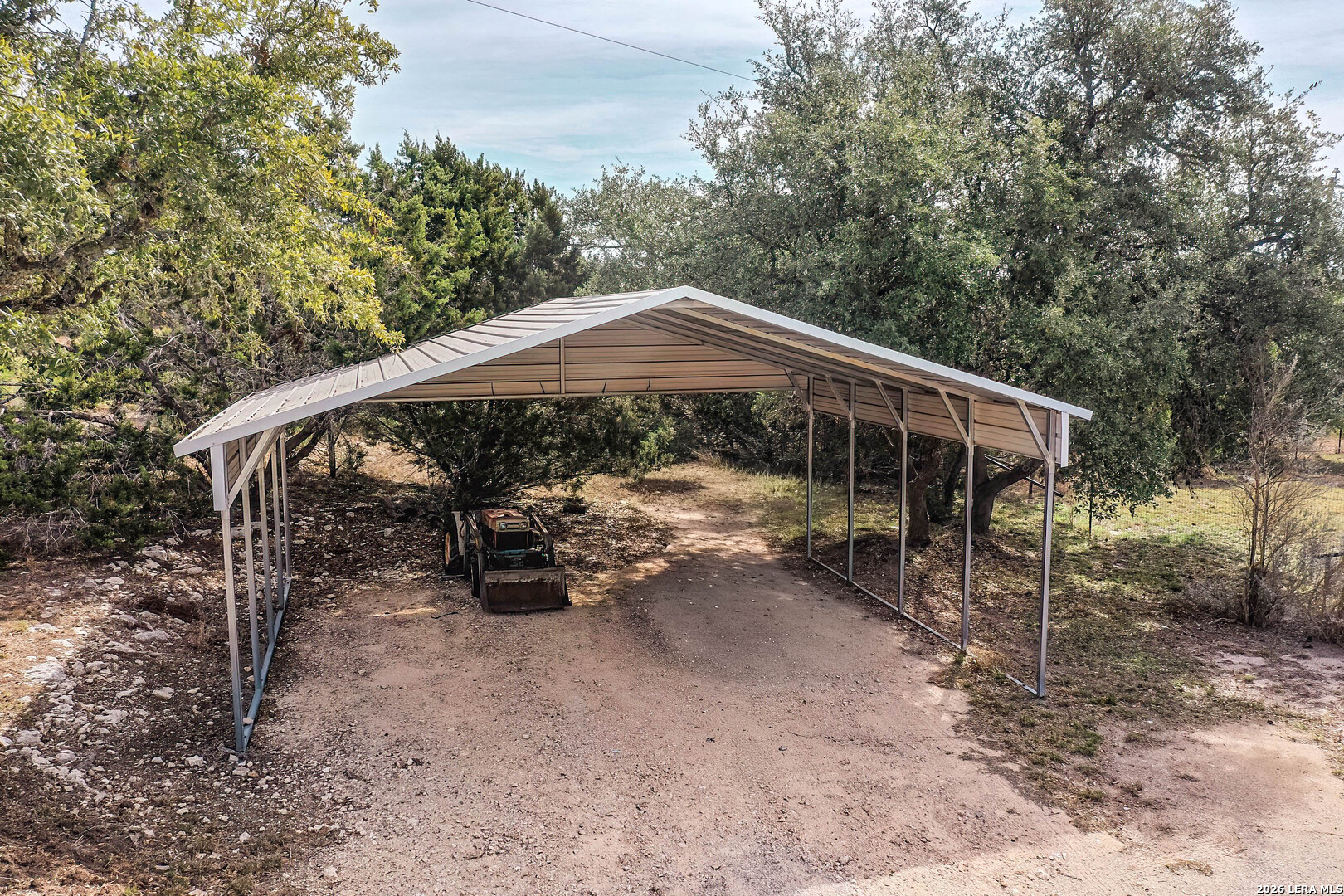 3909 McCall Creek Road Blanco, TX 78606 - Photo 48 of 55 a view of wooden deck in the backyard