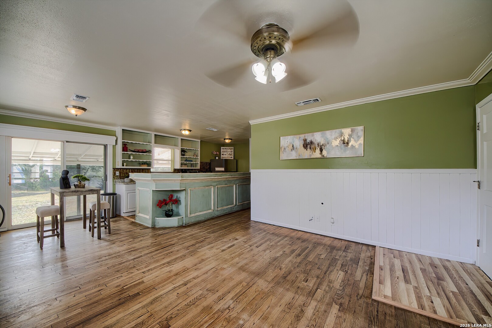 3909 McCall Creek Road Blanco, TX 78606 - Photo 5 of 55 a view of a kitchen with a sink and microwave