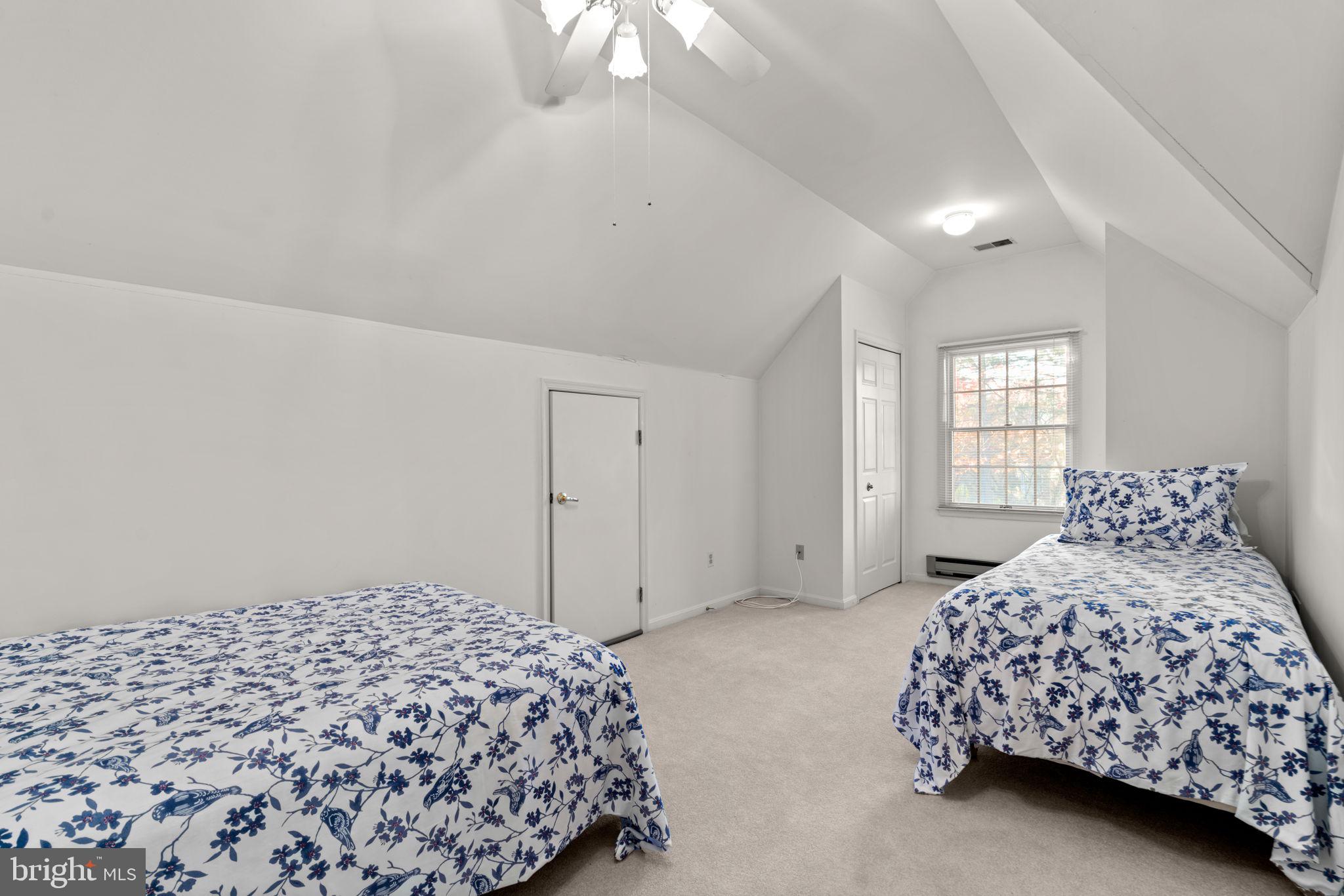 5161 Harpers Farm Road, Unit 27 Columbia, MD 21044 - Photo 29 of 55 a bedroom with a bed and a window