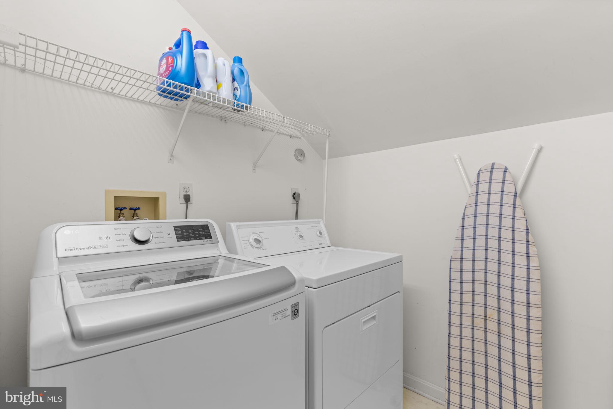 5161 Harpers Farm Road, Unit 27 Columbia, MD 21044 - Photo 32 of 55 a utility room with dryer and washer