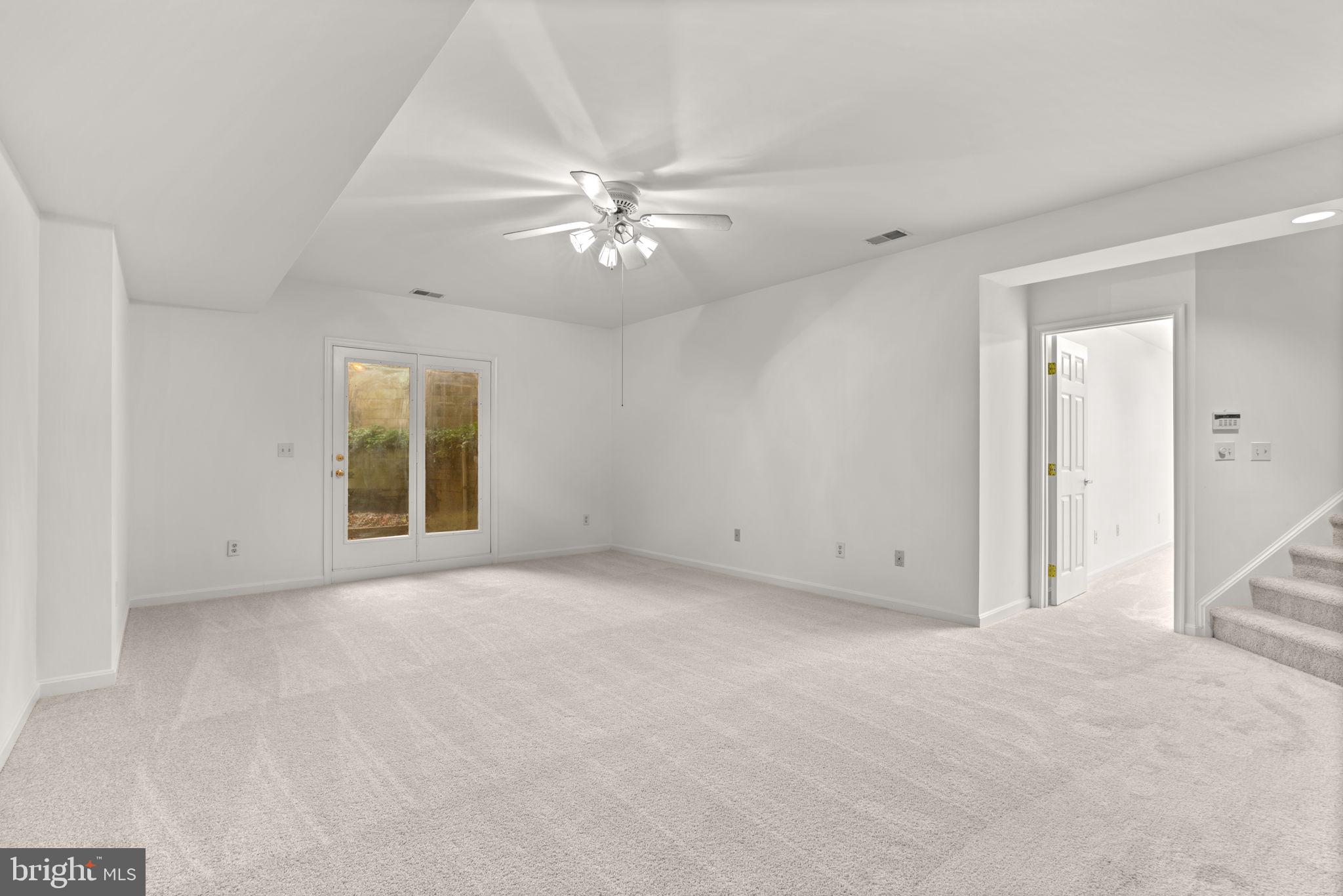 5161 Harpers Farm Road, Unit 27 Columbia, MD 21044 - Photo 34 of 55 a view of an empty room with a window