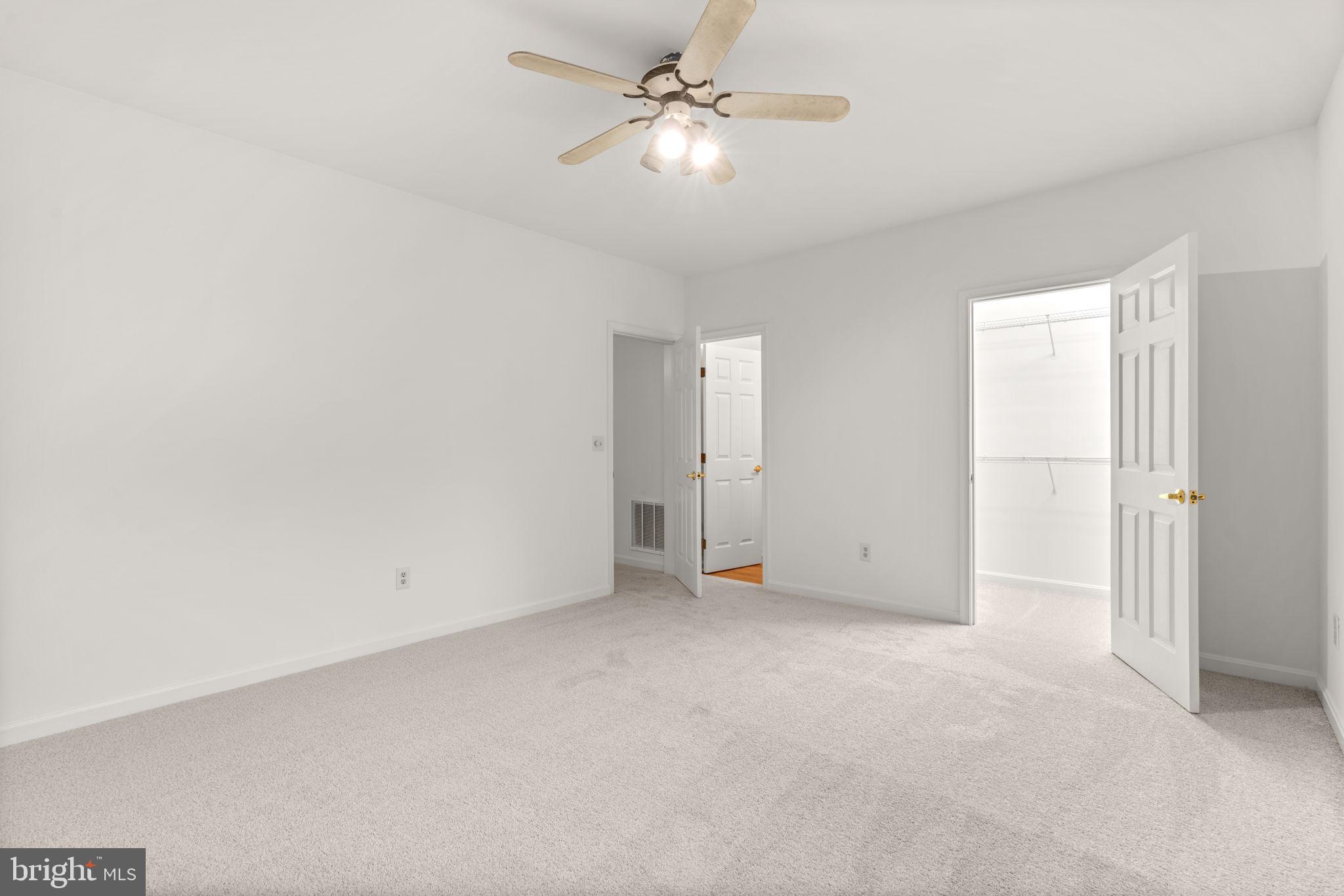 5161 Harpers Farm Road, Unit 27 Columbia, MD 21044 - Photo 38 of 55 wooden floor in an empty room